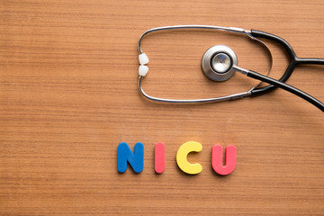 A stethoscope with the word NICU written underneath